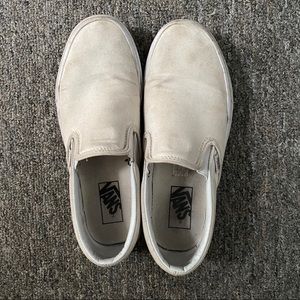 worn white slip on vans